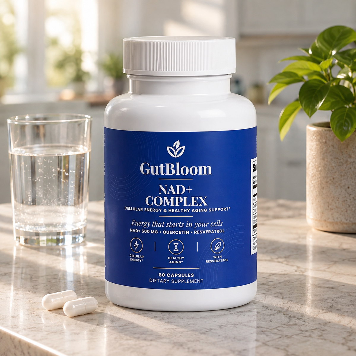 GutBloom NAD+ Complex bottle on a marble kitchen counter with a glass of water